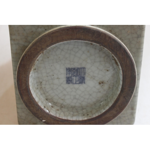 162 - Chinese heavy crackle glazed ribbed square section vase, blue mark to base, 28cm.