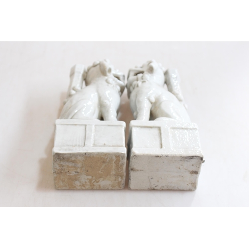 163 - Pair Chinese glazed porcelain Foo dogs, 22.5cm.