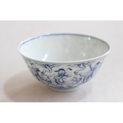 173 - Chinese blue and white bowl with elders decoration, six character mark, 16cm diameter.