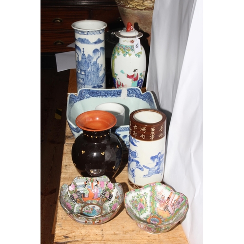 34 - Three Chinese vases and bow, two dishes and pottery vase (7).
