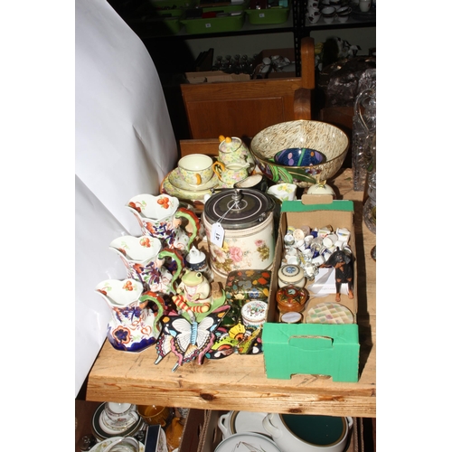 41 - China including three graduated jugs, biscuit jar, Grimwades bowl, ornaments, thimbles, etc.