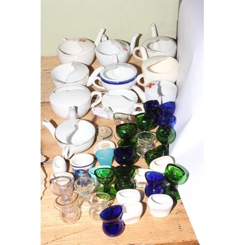 50 - Ten vintage feeding cups and over thirty eye baths.