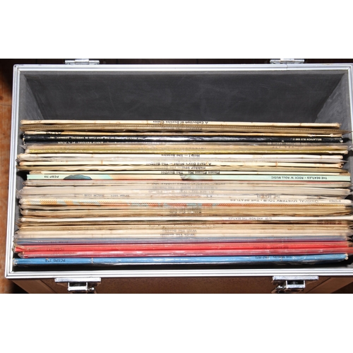 124 - Case of Beatles vinyl records including Sgt Peppers Club Band, red and blue vinyls, Yellow Submarine... 