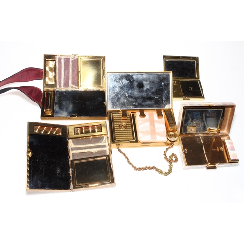 3 - Collection of gilt metal and mother of pearl compacts.