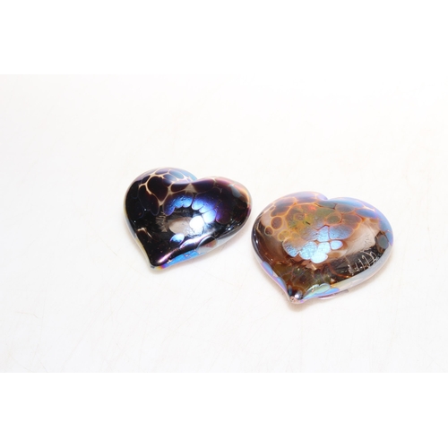 307 - Two John Ditchfield heart shaped paperweights.