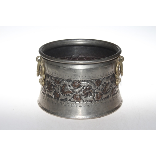 142 - Antique Eastern Persian silver and copper two handled bowl, 21cm high.