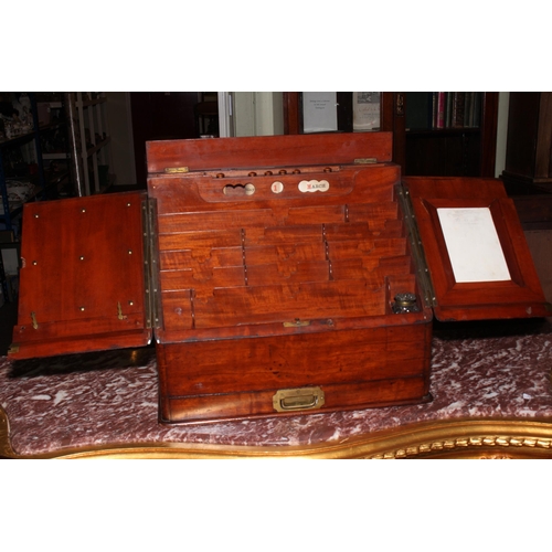 150 - Victorian mahogany slope front stationery box with two doors enclosing calendar and fitted interior ... 