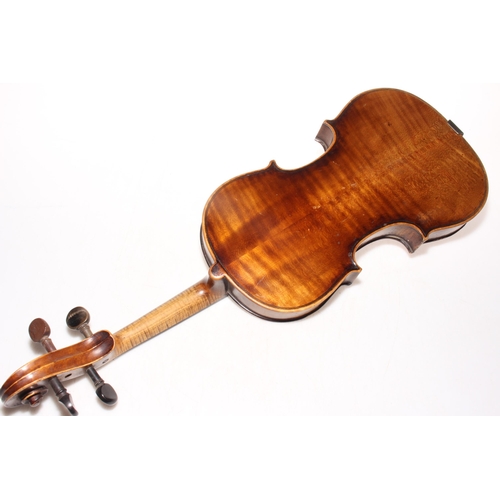 158 - Antique mahogany violin with leather case.