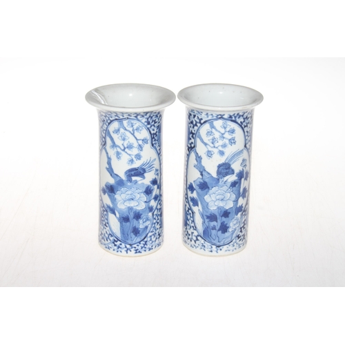 162 - Pair Chinese blue and white cylindrical vases with four character mark, 15cm.