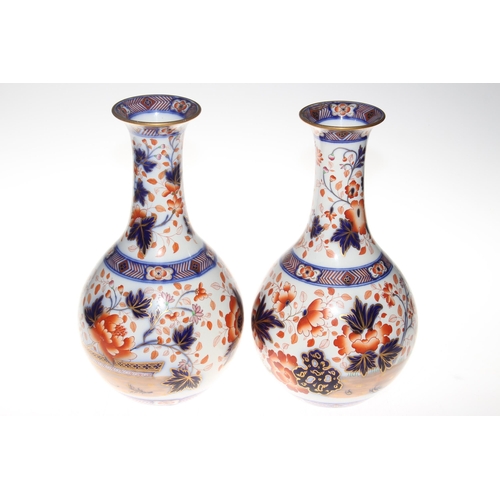 163 - Pair large 19th Century ironstone vases with foliage decoration in blue, iron red and gilt, 34.5cm.