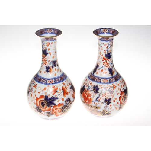 163 - Pair large 19th Century ironstone vases with foliage decoration in blue, iron red and gilt, 34.5cm.