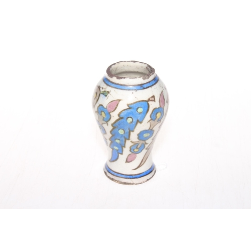 170 - Antique Iznik pottery vase with stylised leaf decoration, 13cm.