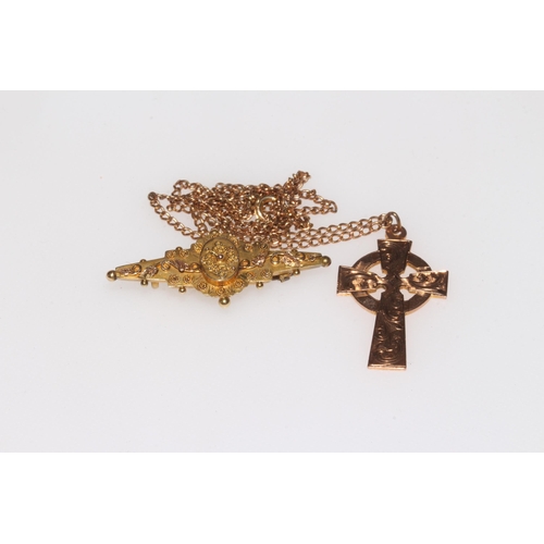 186 - Late Victorian 9 carat gold die-stamped brooch, 4.25cm across, and 9 carat gold engraved cross with ... 