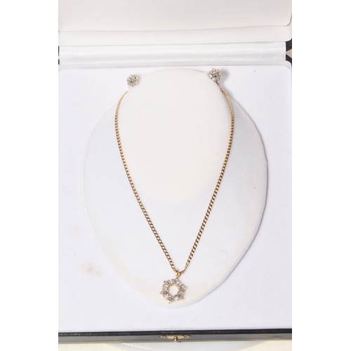 197 - Diamond set 18 carat gold pendant with ring of six stone clusters and 18 carat gold chain necklace, ... 