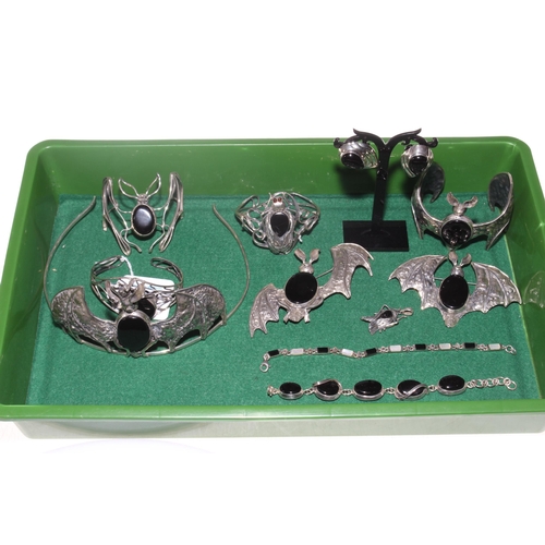 198 - Collection of twelve pieces of silver and Whitby Jet jewellery, mostly of bat formations comprising ... 