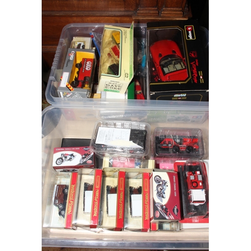 22 - Two boxes of boxed model vehicles including Burago, Models of Yesteryear, Corgi, etc.