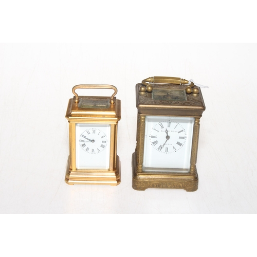 221 - Two small French carriage clocks, one with engraved decoration, 9cm high.