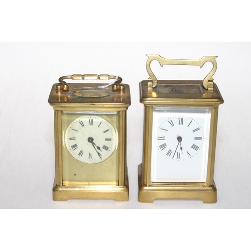 222 - Two gilt brass carriage clocks, one by R & Co, Paris, 14.5cm to top of handle.