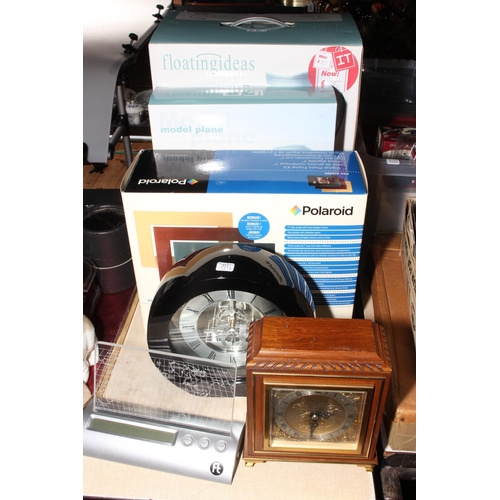 24 - Floating Ideas Globe and Plane, Polaroid 7inch digital frame and three clocks including Elliot mante... 