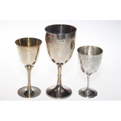 265 - Three silver goblets, two with inscriptions, the smallest 13cm, hallmarked London 1877.