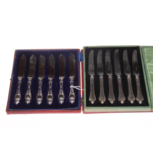 280 - Two cased sets of six silver handled tea knives.