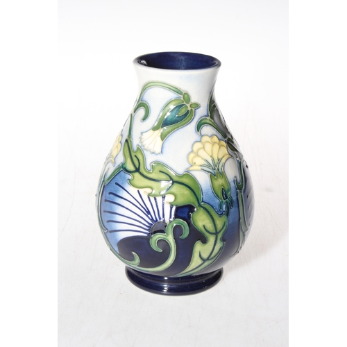 288 - Moorcroft vase with stylised foliage decoration, bearing artists signature, 13.5cm, boxed.