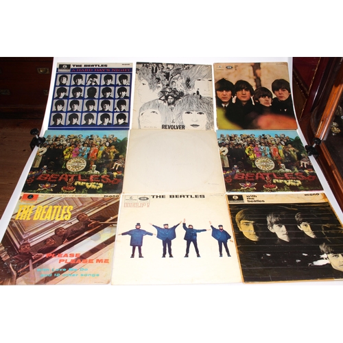 294 - Collection of fourteen Beatles LP's, and four others.