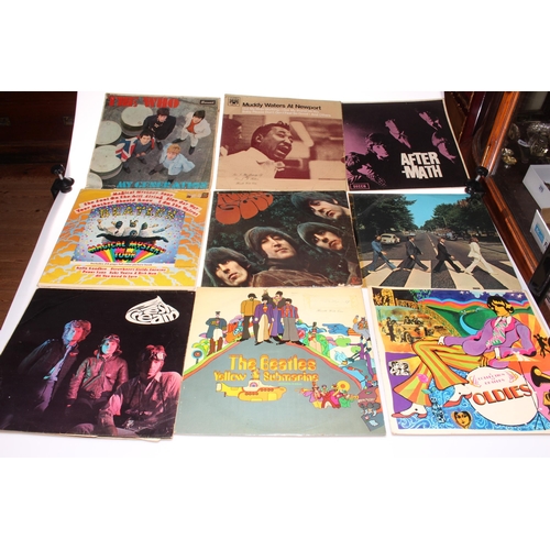 294 - Collection of fourteen Beatles LP's, and four others.