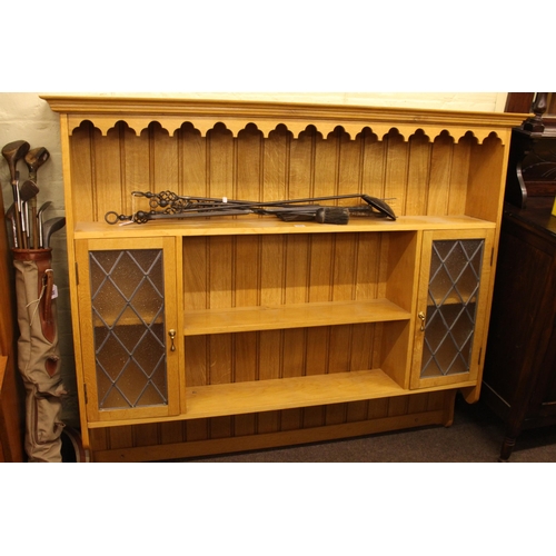 349 - Light oak shelf and leaded glazed door wall rack, 122cm by 148cm by 25cm.