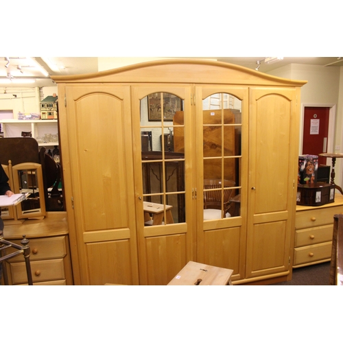 375 - Light wood five piece bedroom suite comprising four door wardrobe, pedestal dressing table, dressing... 