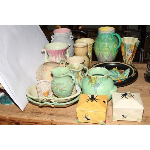 41 - Collection of Crown Devon Pottery including vases, jugs, bowls, wall plaque and two preserve pots.