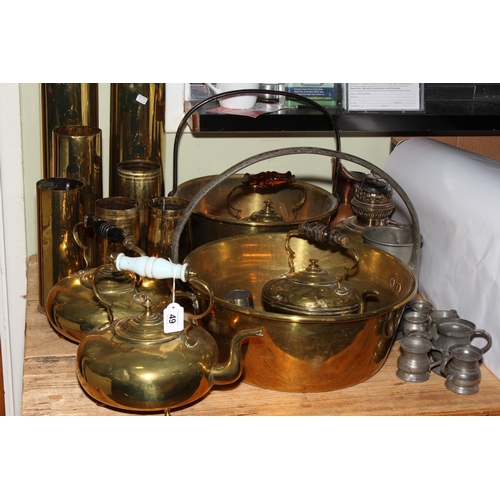 49 - Collection of Victorian and later brass including shell cases, jam pans, kettles and pewter measures... 