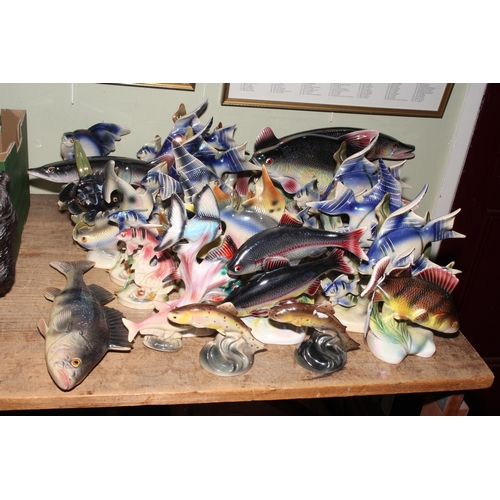 53 - Large collection of Jema Holland Pottery lustre fish.