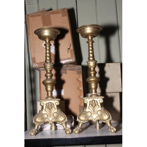 56 - Pair of brass pricket candlesticks, 41cm.