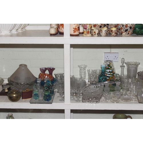 94 - Large collection of glassware including vases, bowls, trinket ware, paperweights, decanter, etc.