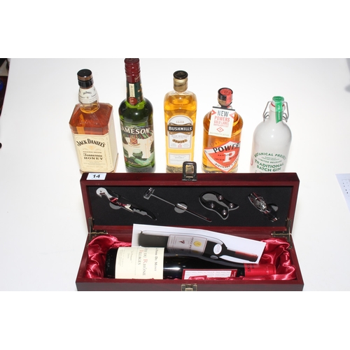 14 - Three bottles of Irish whiskey including Jamesons, Bushmills and Powers, Jack Daniels, bottle of tra... 