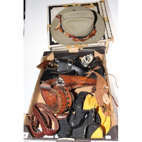 19 - WITHDRAWN
Cowboy accessories including boxed Stetson, gun belts and holsters, replica guns, etc.