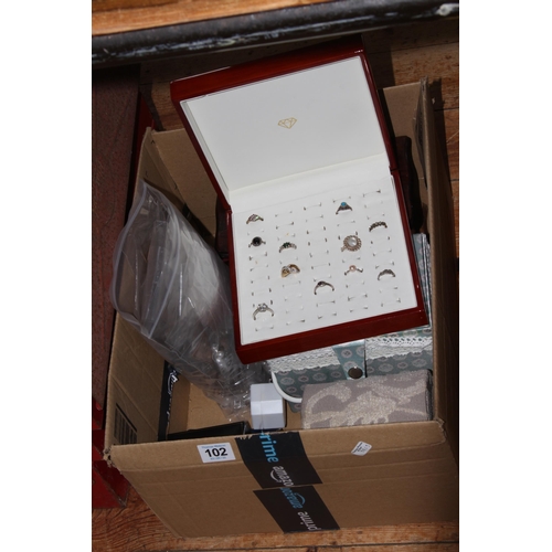 102 - Collection of jewellery boxes and jewellery including silver rings, natural opal jewellery, etc.