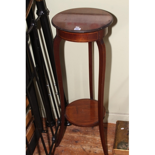 184 - Taxidermy mounted fox head and an inlaid mahogany plant stand, 94cm high.