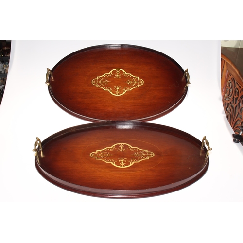 187 - Pair of Victorian inlaid mahogany brass handled trays.