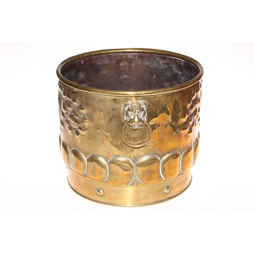 198 - Ornate brass two handled jardiniere, 29cm high.