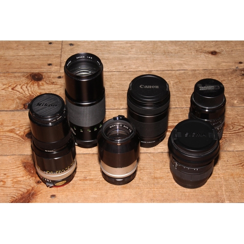 31 - Canon cameras, various lenses, tripods and accessories, LP records, etc.