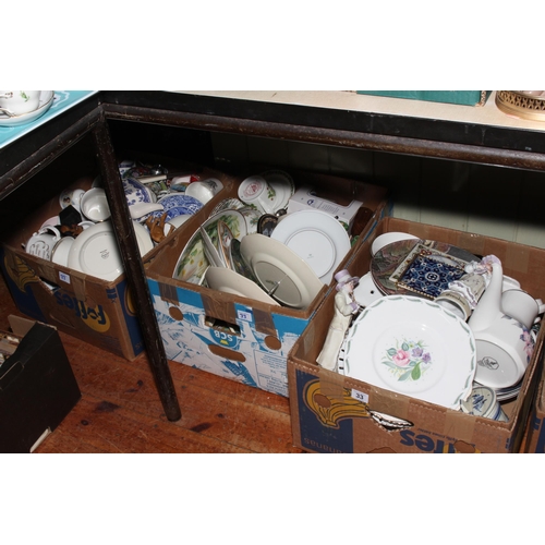 33 - Four boxes of assorted china and glassware, various postcards, phonecards, etc.