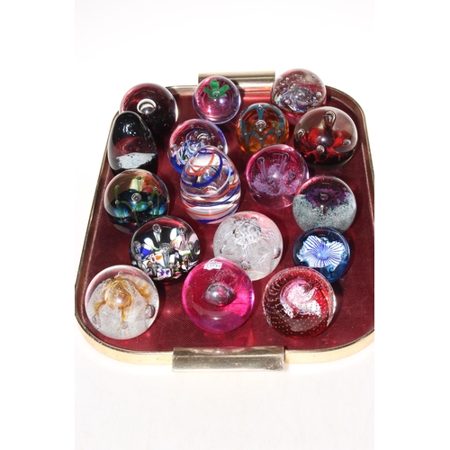 4 - Collection of seventeen glass paperweights including several Caithness Glass.