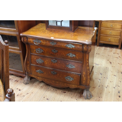 557 - Antique oak and marquetry inlaid four drawer serpentine front chest on substantial ball and claw leg... 