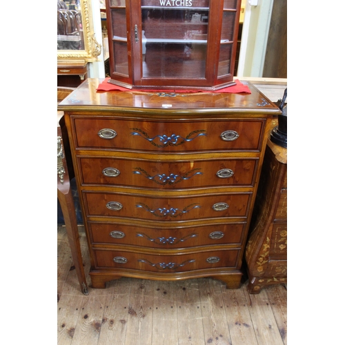 561 - Yew five drawer serpentine front chest painted with ribbons, 94.5cm by 77cm by 46cm.