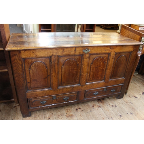 563 - Antique oak quadruple arched panel front mule chest with two base drawers, 78cm by 138cm by 52cm.