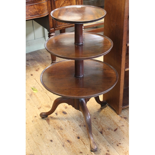 565 - Georgian mahogany graduated three tier circular dumb waiter on tripod base, 101cm.