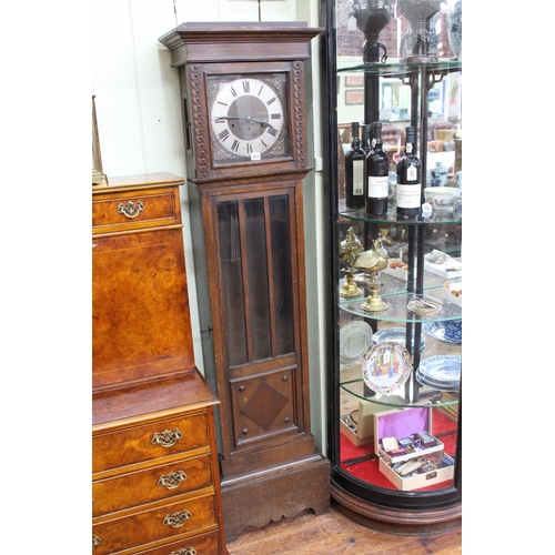 569 - 1920's oak longcase clock, 179.5cm.