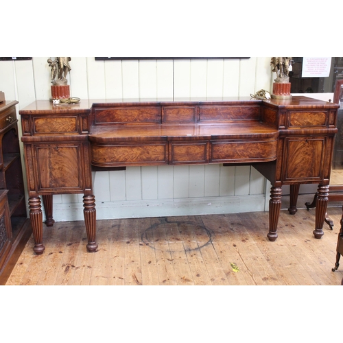 576 - Regency mahogany pedestal sideboard on turned fluted legs, 109cm by 230cm by 74cm.